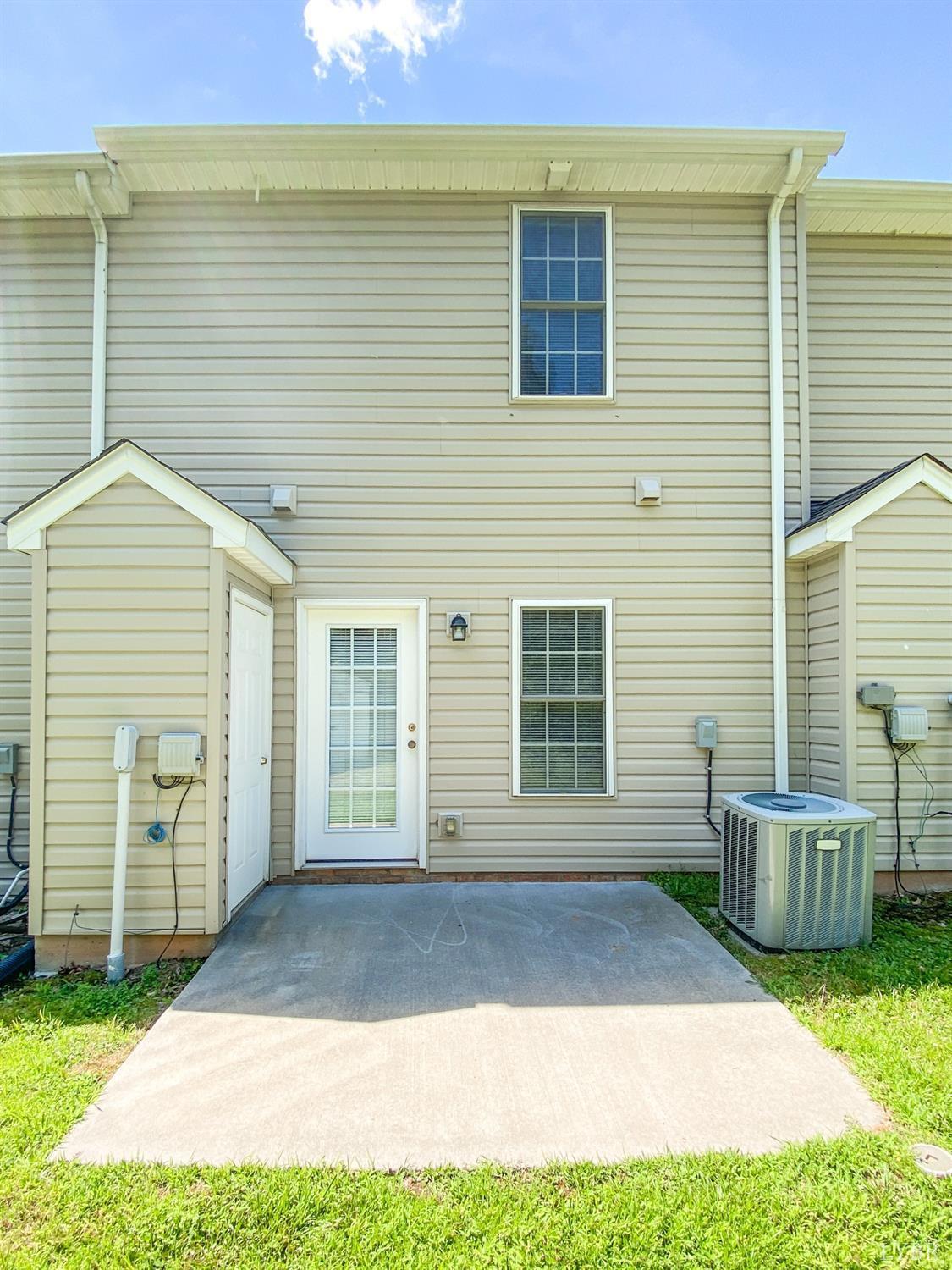 1600 Wards Ferry Road, Unit 103 Lynchburg, VA 24502 - Photo 6 of 23 a view of a house with a yard