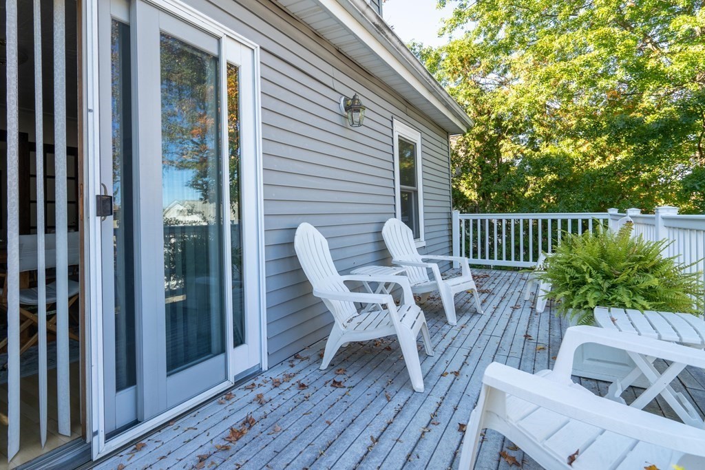 55 Waldeck Road Milton, MA 02186 - Photo 12 of 28 a view of balcony with furniture and wooden deck