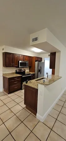 a bathroom with a bathtub and a toilet