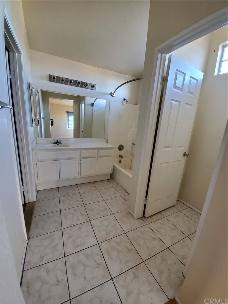 39837 Falcon Way Murrieta, CA 92562 - Photo 11 of 12 a view of living room with a fireplace and furniture