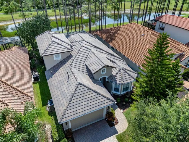 an aerial view of a house with a garden