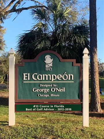 a view of a swimming pool with an ocean from the view