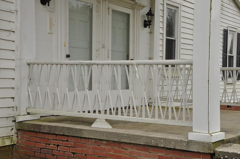 4976 Ross West Road Dunn, NC 28334 - Photo 15 of 20 a view of a wooden door of the house