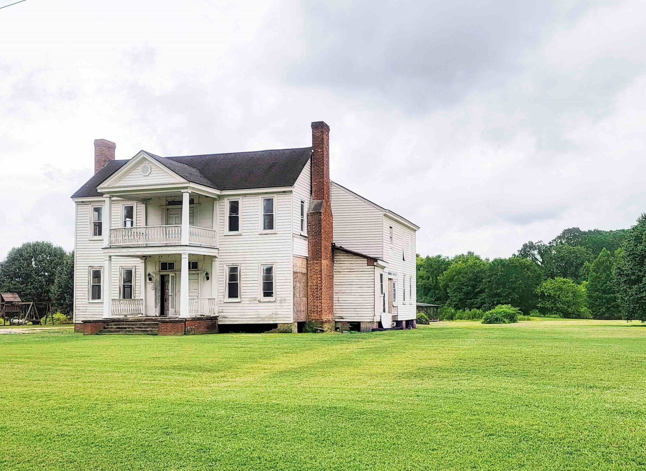 4976 Ross West Road Dunn, NC 28334 - Photo 16 of 20 a front view of a house with a garden