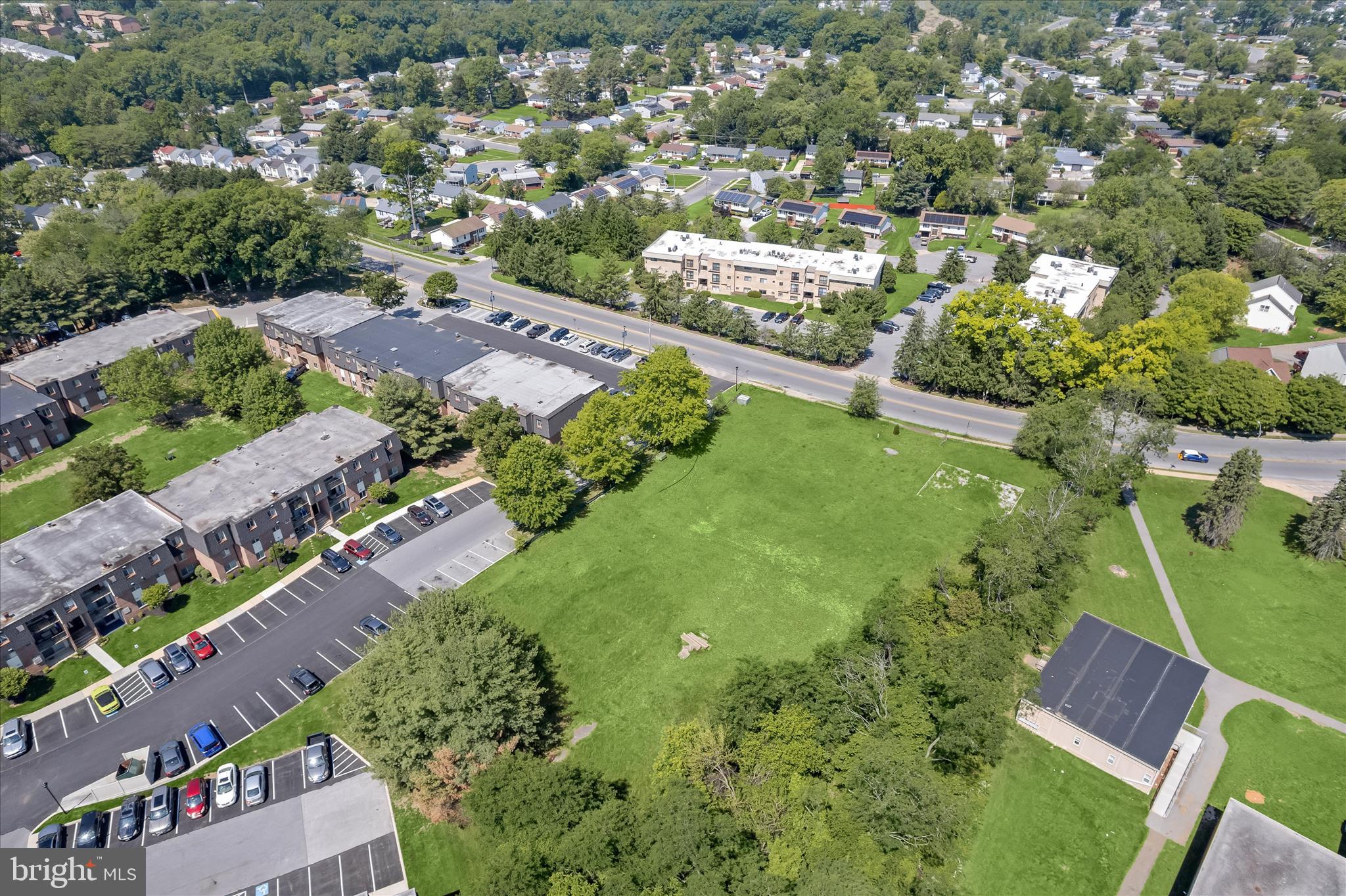 3925 Rolling Rd. Baltimore, MD 21208 - Photo 9 of 27 an aerial view of residential houses with outdoor space