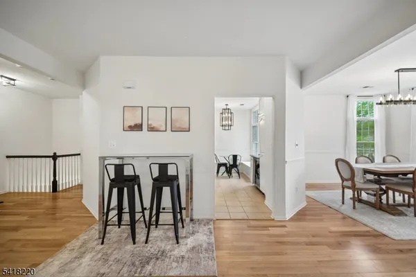 a view of a dining room with furniture and window