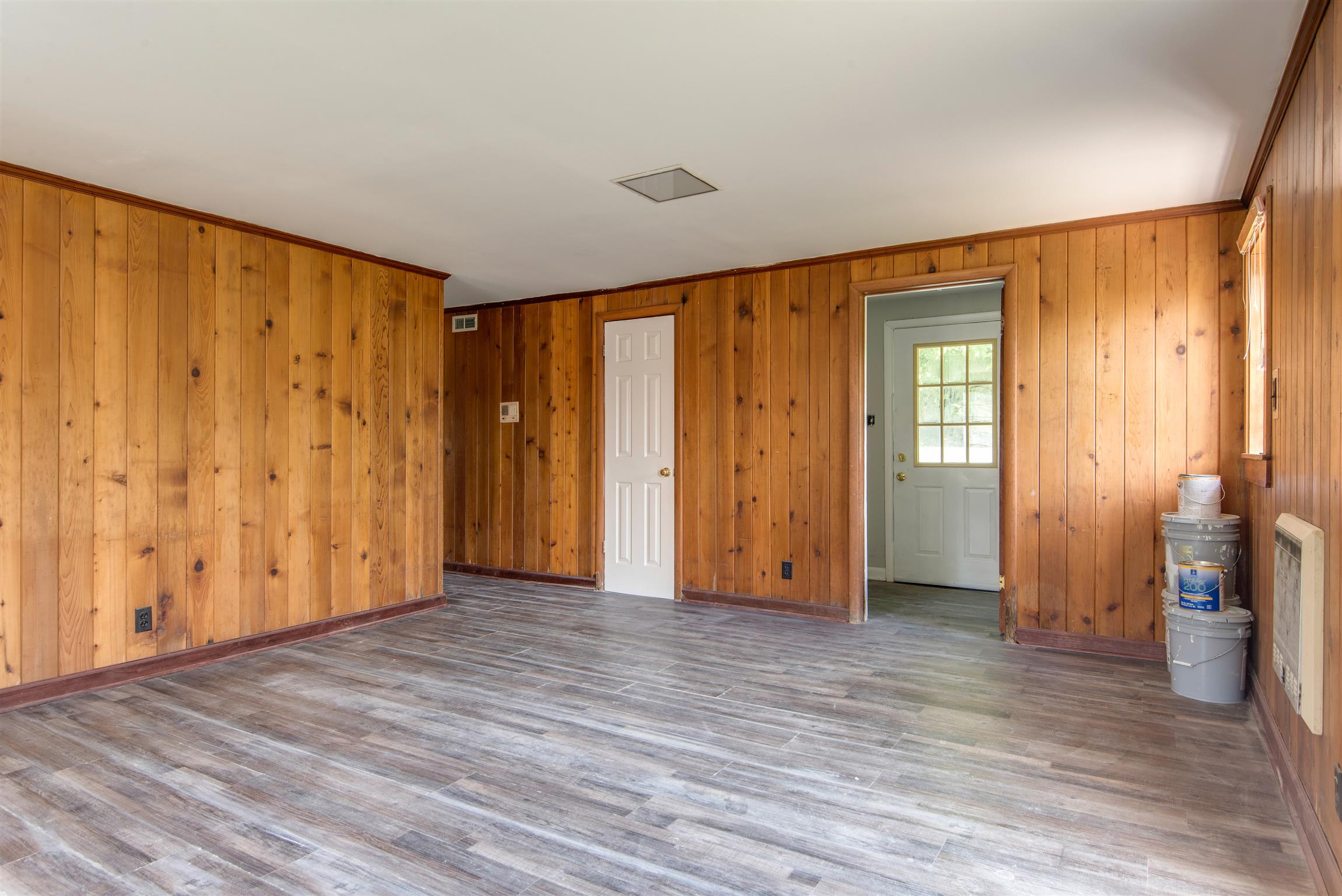 110 Dabney Drive Franklin, TN 37064 - Photo 16 of 25 an empty room with wooden floor and closet area