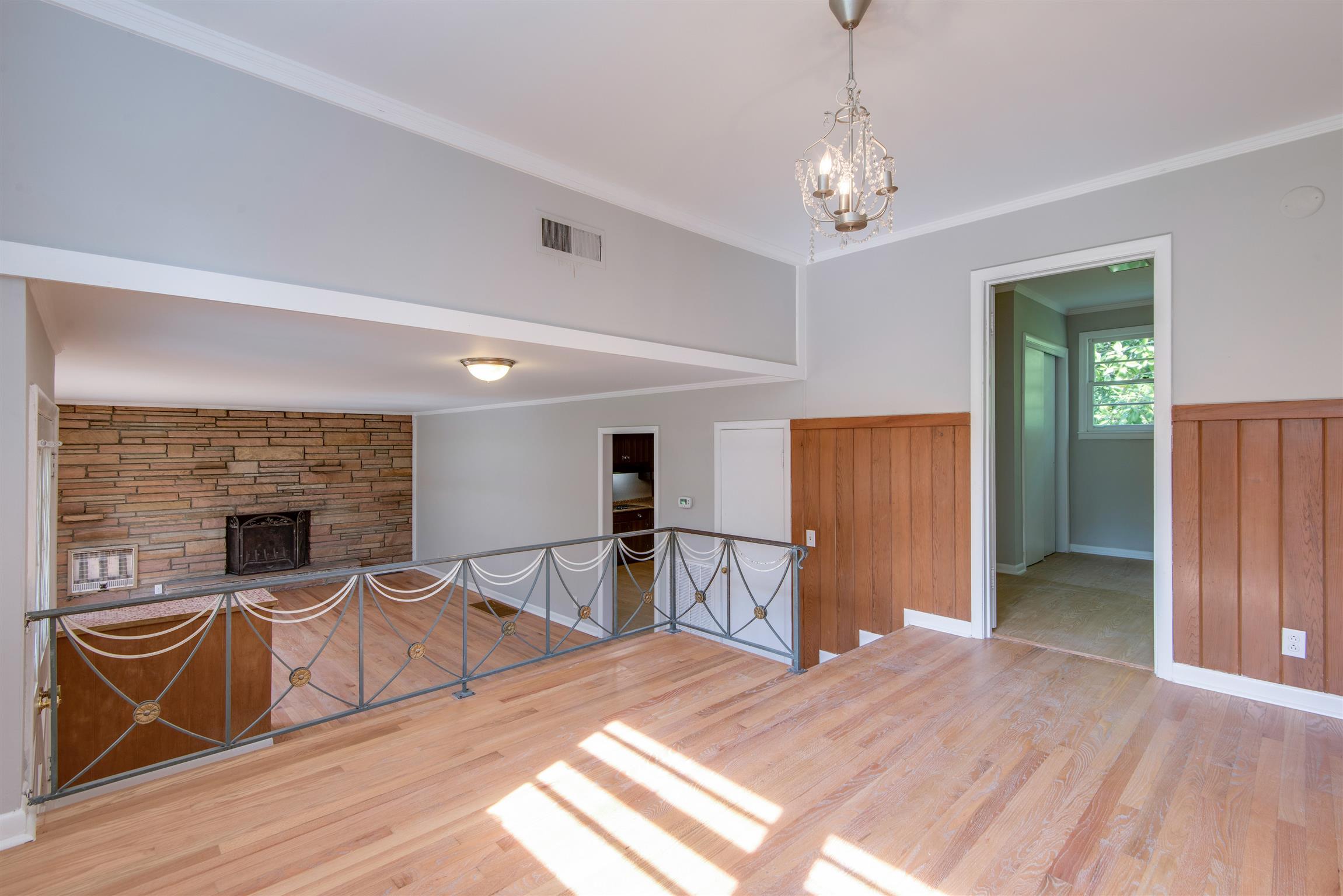 110 Dabney Drive Franklin, TN 37064 - Photo 7 of 25 a living room with furniture and a fireplace