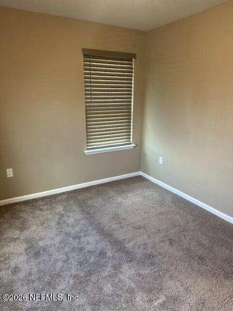 9670 Freefall Road Jacksonville, FL 32221 - Photo 26 of 31 a view of an empty room with a window