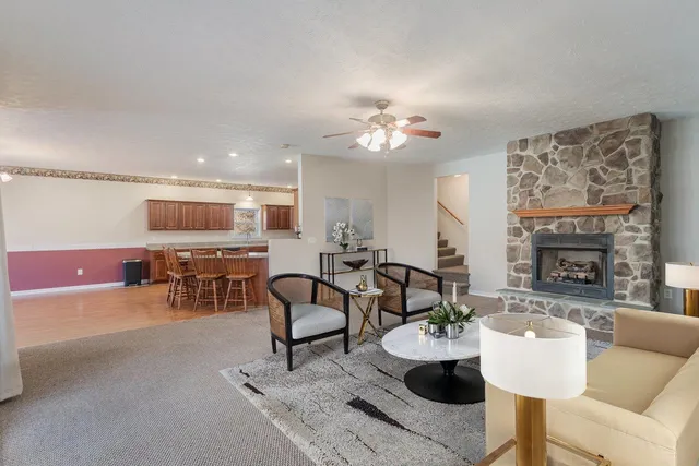 a bedroom with a bed and a fireplace