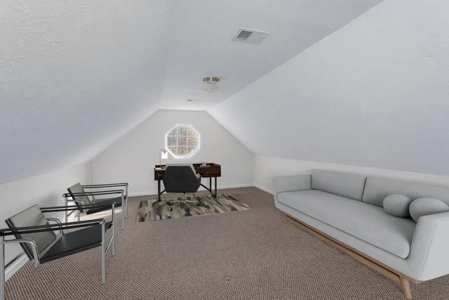 a view of a swimming pool with an outdoor space