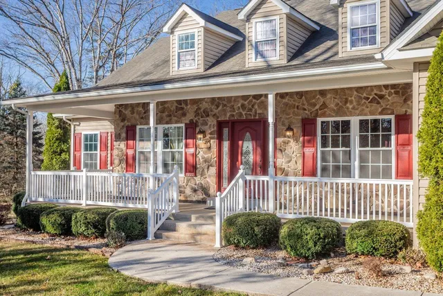 a view of a water pond with green space