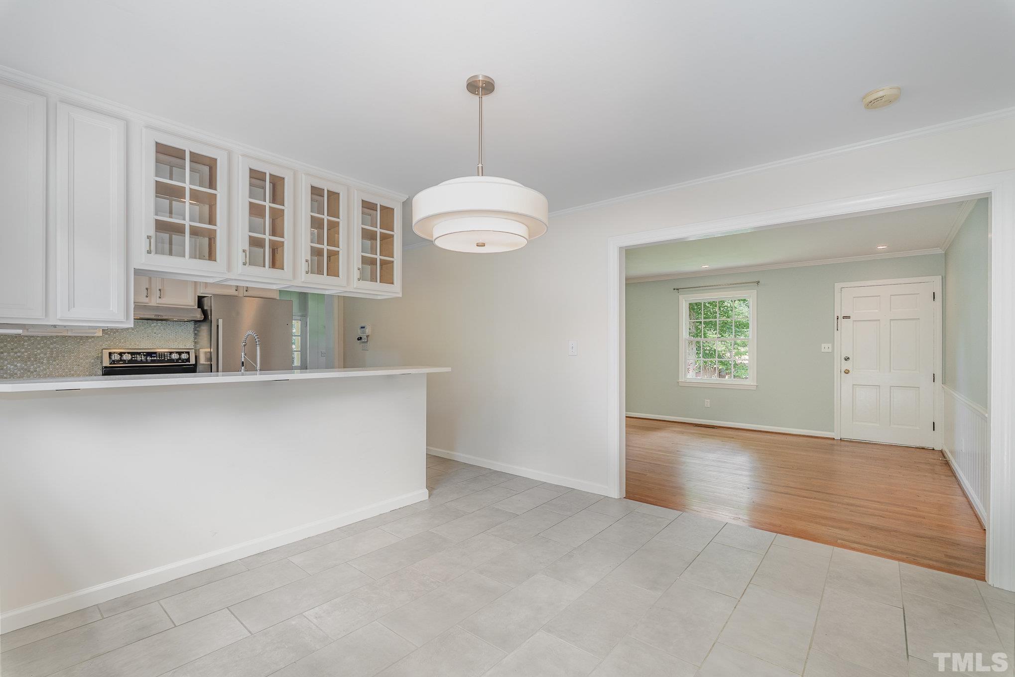 3406 Forest Road Raleigh, NC 27604 - Photo 13 of 31 an empty room with windows