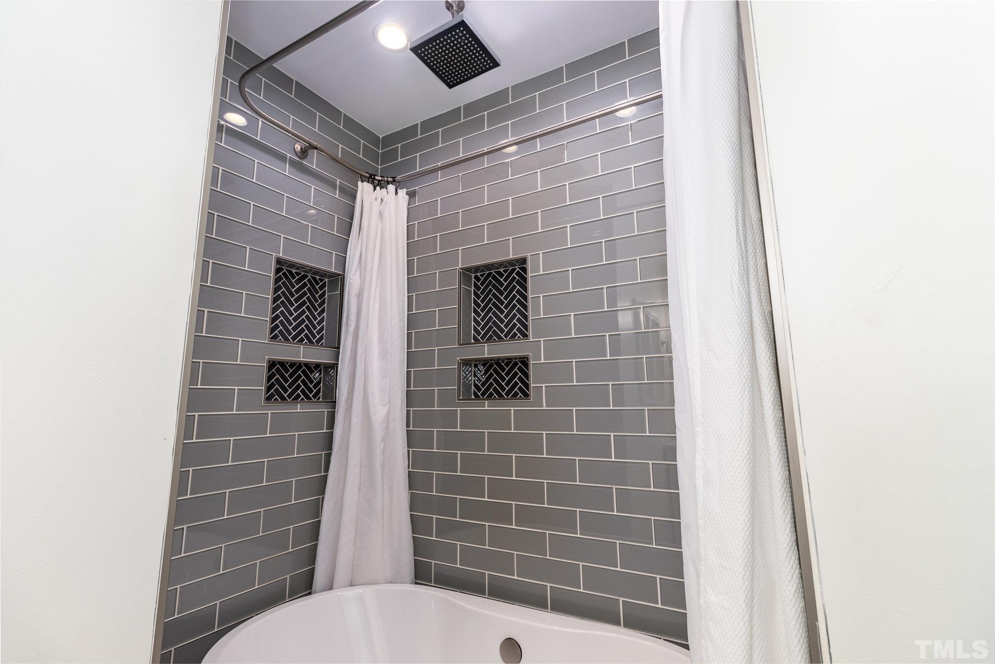 3406 Forest Road Raleigh, NC 27604 - Photo 19 of 31 a bathroom with a toilet and a shower