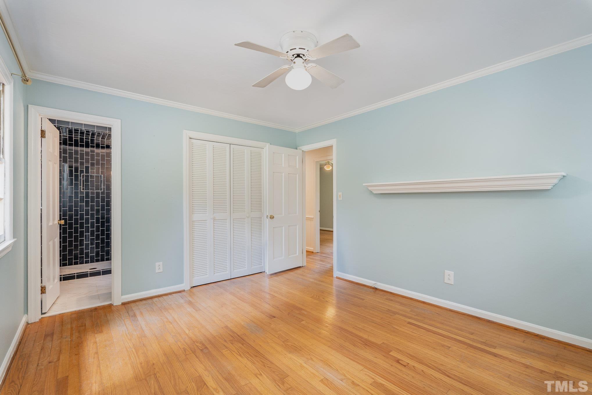 3406 Forest Road Raleigh, NC 27604 - Photo 26 of 31 a view of an empty room with wooden floor
