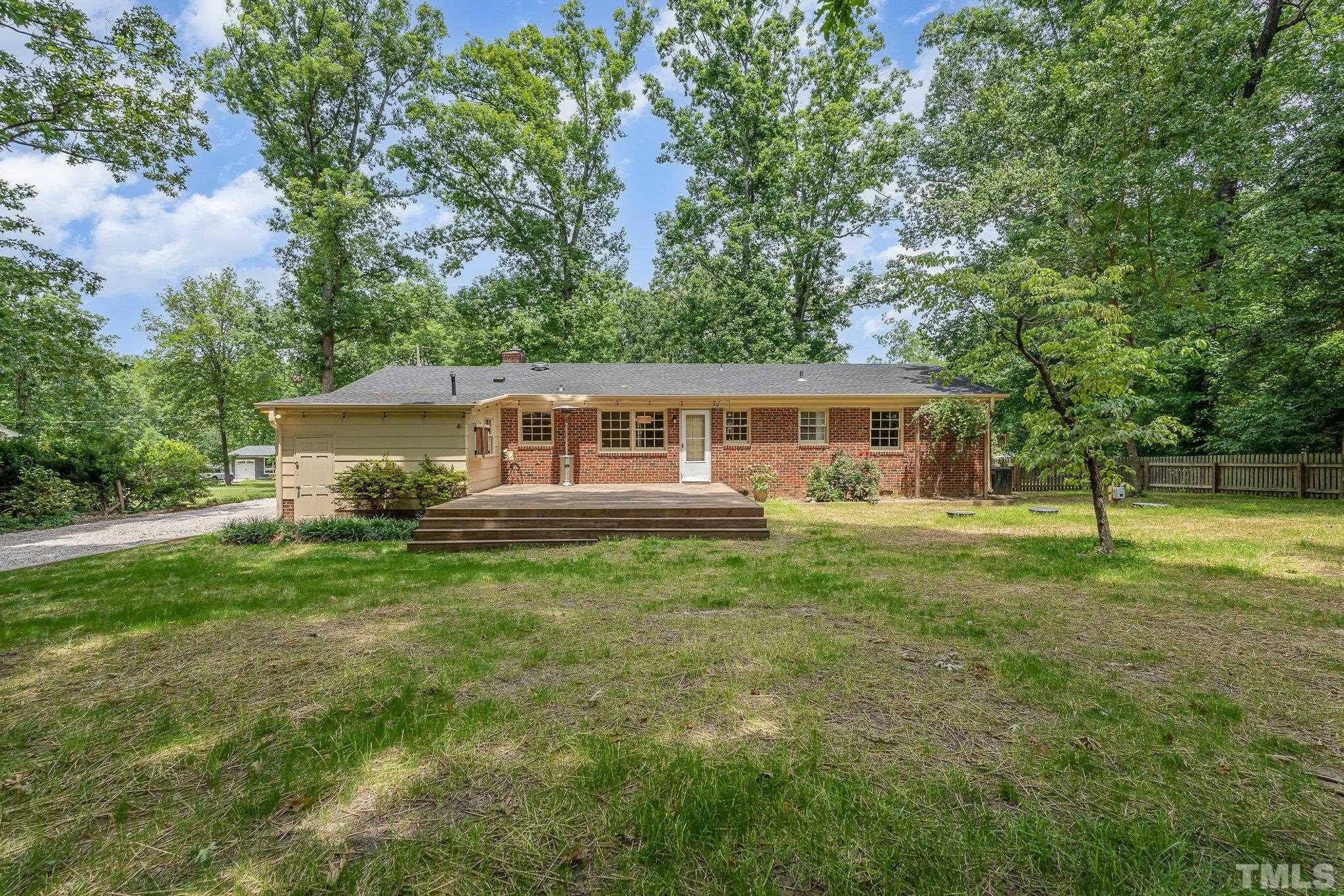 3406 Forest Road Raleigh, NC 27604 - Photo 6 of 31 a front view of house with yard and green space