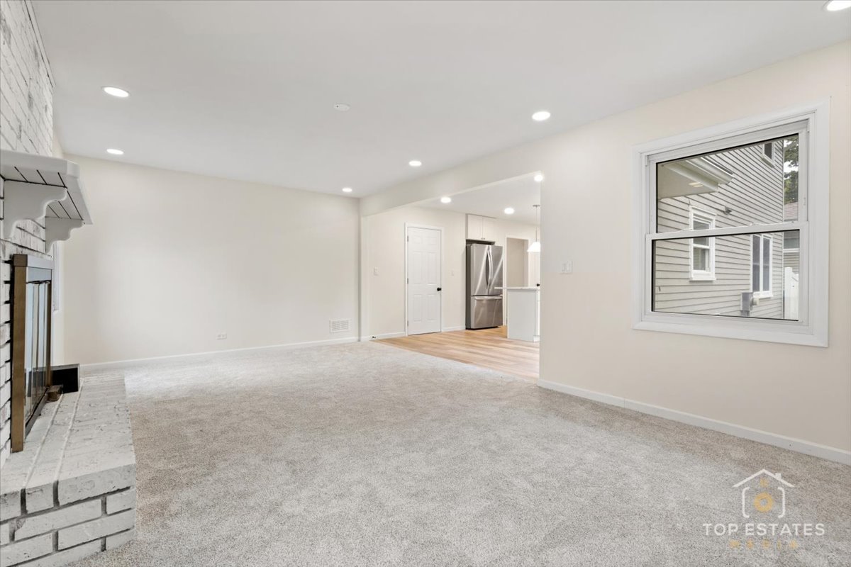 1408 Swallow Street Naperville, IL 60565 - Photo 19 of 54 a view of an empty room with a window