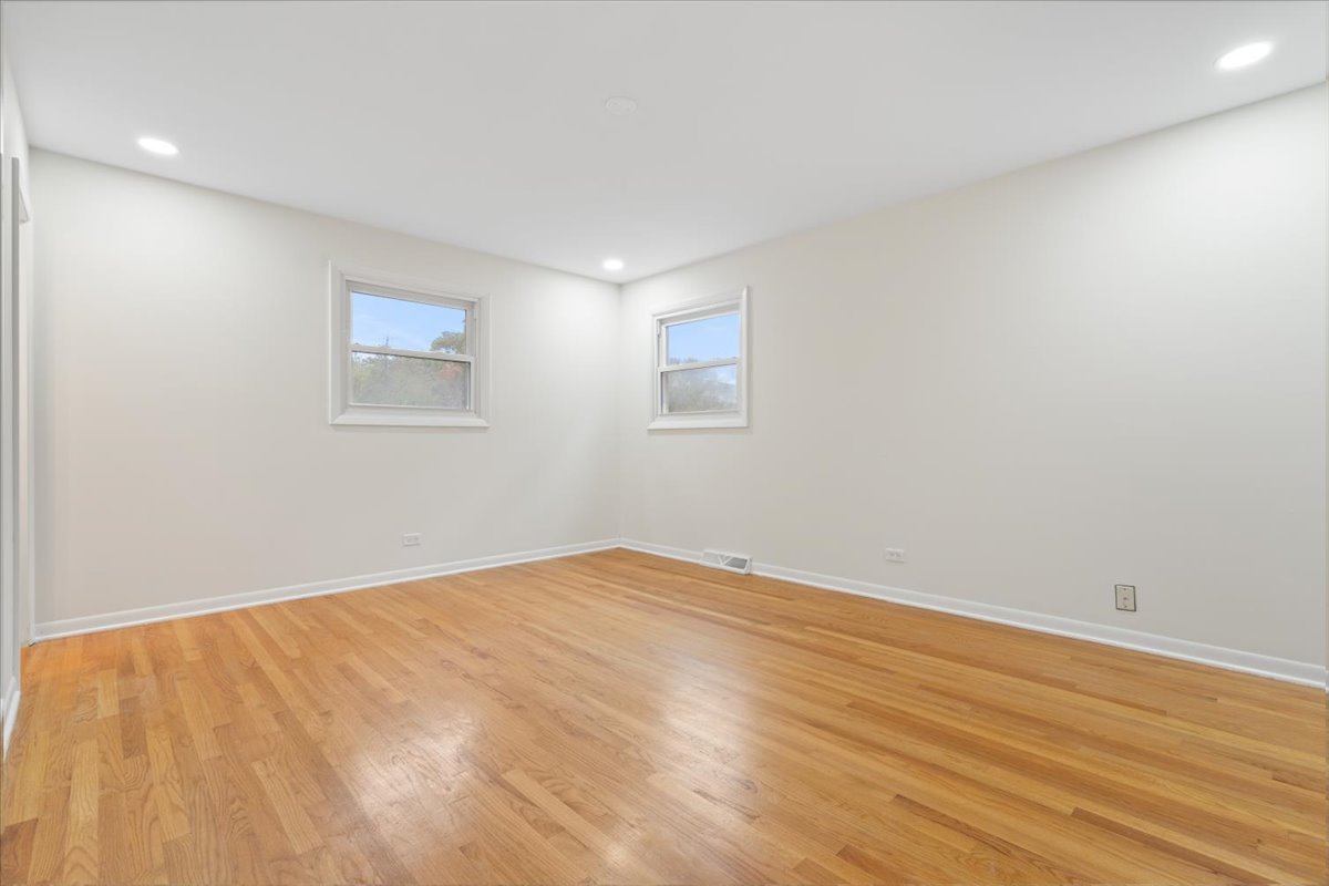 1408 Swallow Street Naperville, IL 60565 - Photo 21 of 54 a view of empty room with wooden floor