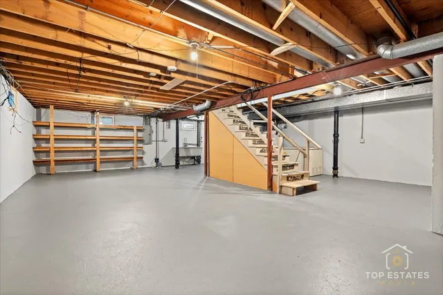 a view of empty room with wooden ceiling