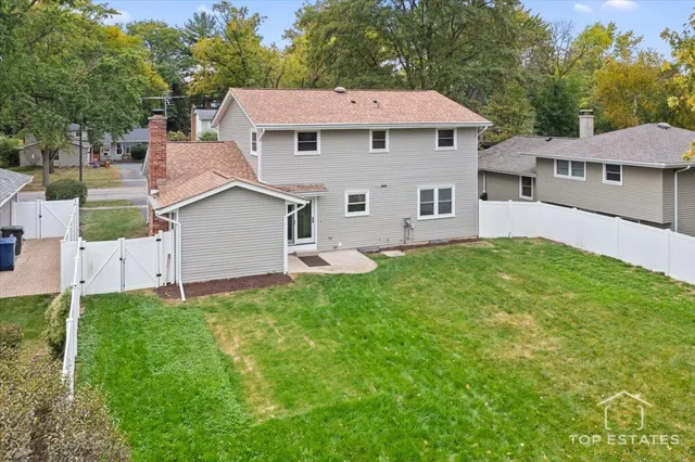 a view of backyard with green space