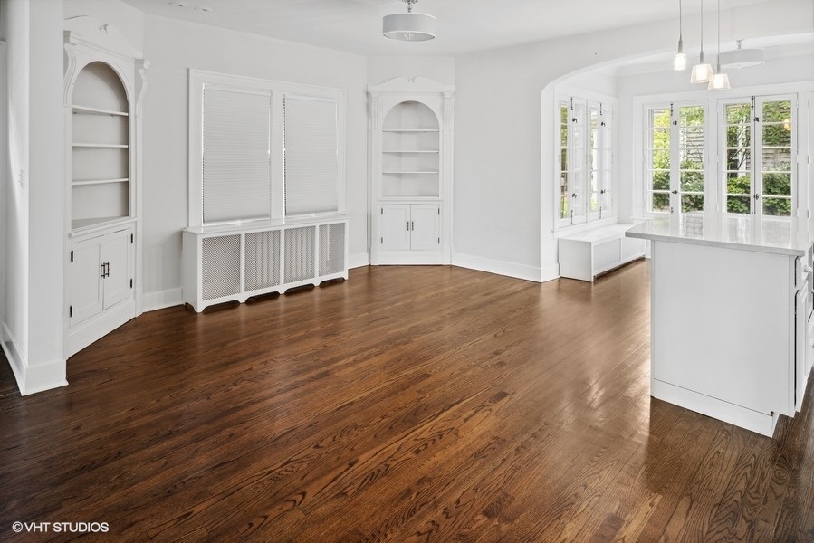152 Bertling Lane Winnetka, IL 60093 - Photo 13 of 38 an empty room with wooden floor and windows