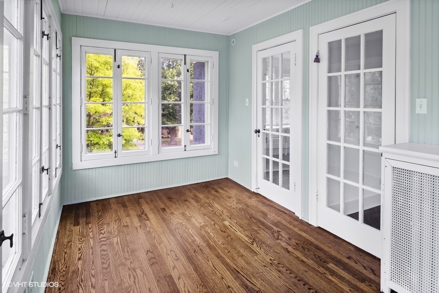 152 Bertling Lane Winnetka, IL 60093 - Photo 25 of 38 an empty room with wooden floor and windows