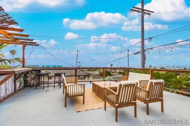 a view of a terrace with sitting area