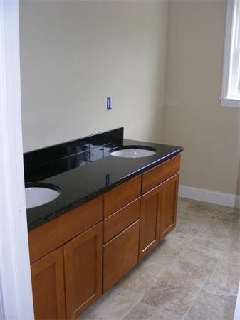 71 Merrimac Road Haverhill, MA 01830 - Photo 17 of 20 a kitchen with a sink and cabinets