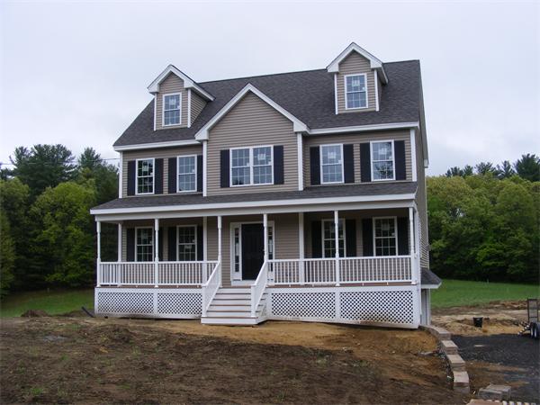 71 Merrimac Road Haverhill, MA 01830 - Photo 4 of 20 a house that has a large window in front of it