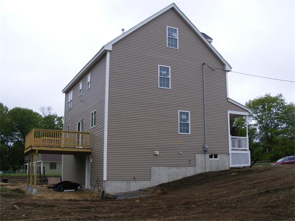 71 Merrimac Road Haverhill, MA 01830 - Photo 9 of 20 a front view of a house with a yard