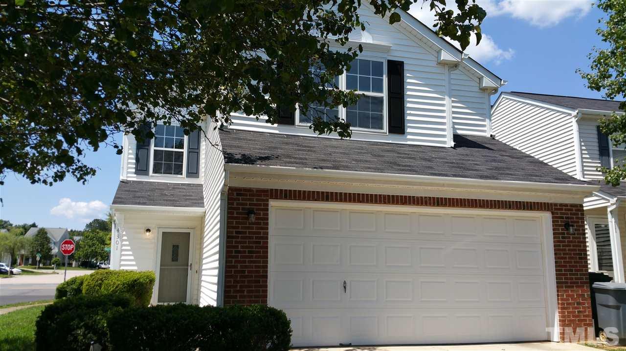 4301 Standing Rock Way Raleigh, NC 27604 - Photo 1 of 22 a front view of a house with garden
