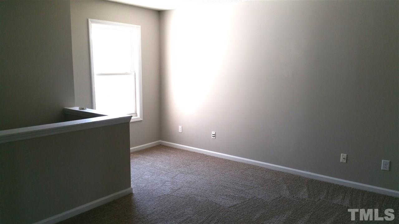 4301 Standing Rock Way Raleigh, NC 27604 - Photo 12 of 22 an empty room with a window