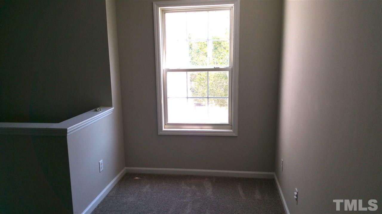 4301 Standing Rock Way Raleigh, NC 27604 - Photo 13 of 22 a view of an empty room with a window