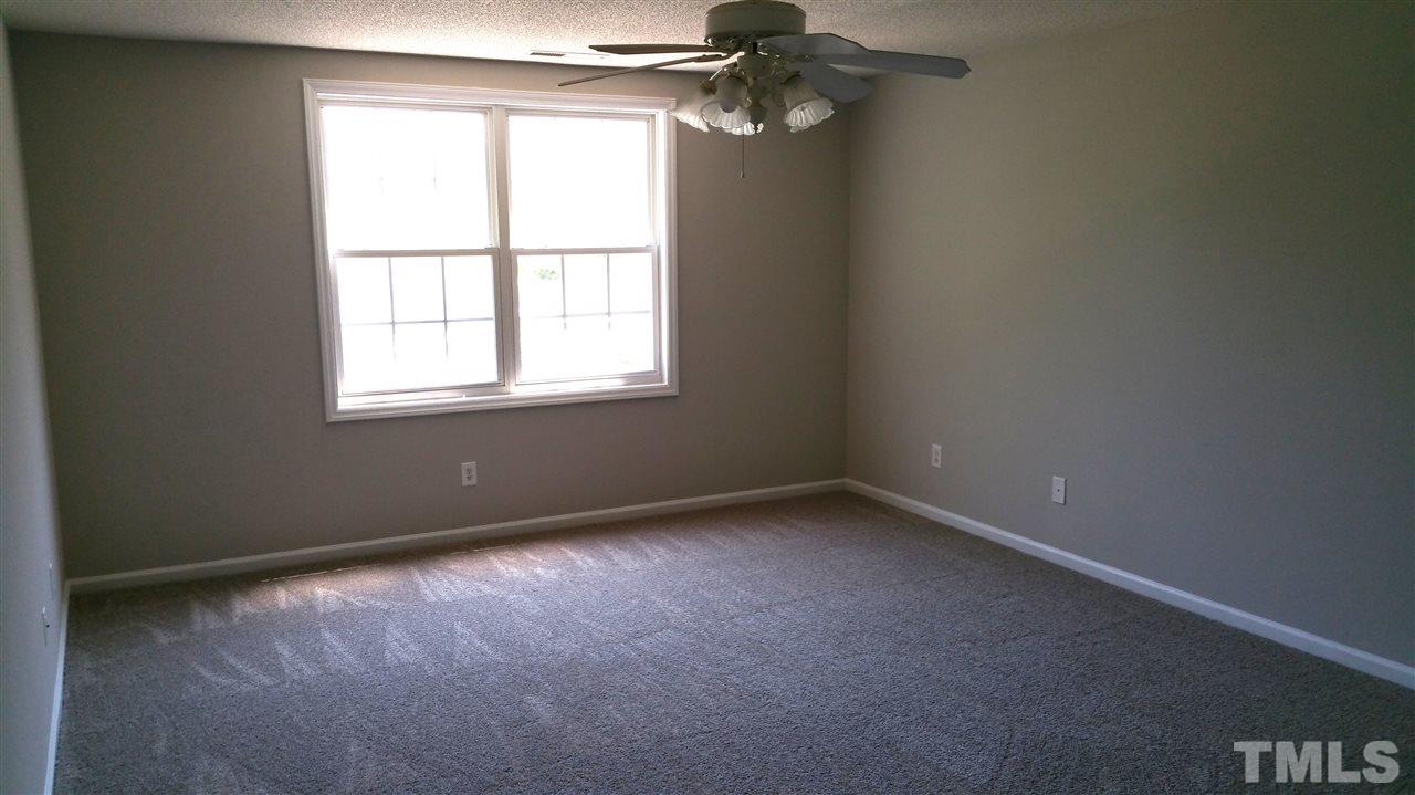 4301 Standing Rock Way Raleigh, NC 27604 - Photo 15 of 22 an empty room with a window