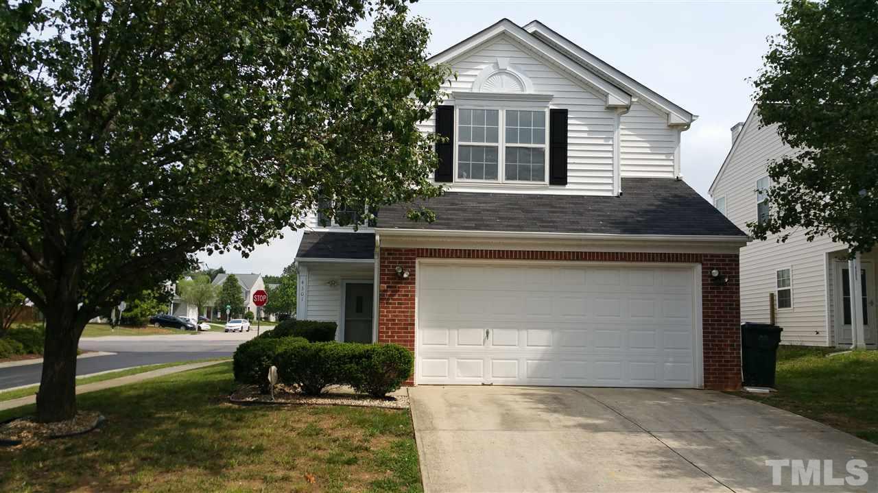 4301 Standing Rock Way Raleigh, NC 27604 - Photo 22 of 22 a front view of a house with a yard