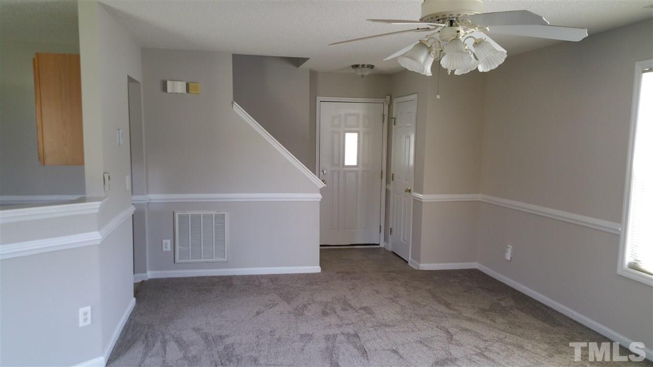 4301 Standing Rock Way Raleigh, NC 27604 - Photo 9 of 22 wooden floor in an empty room with a window
