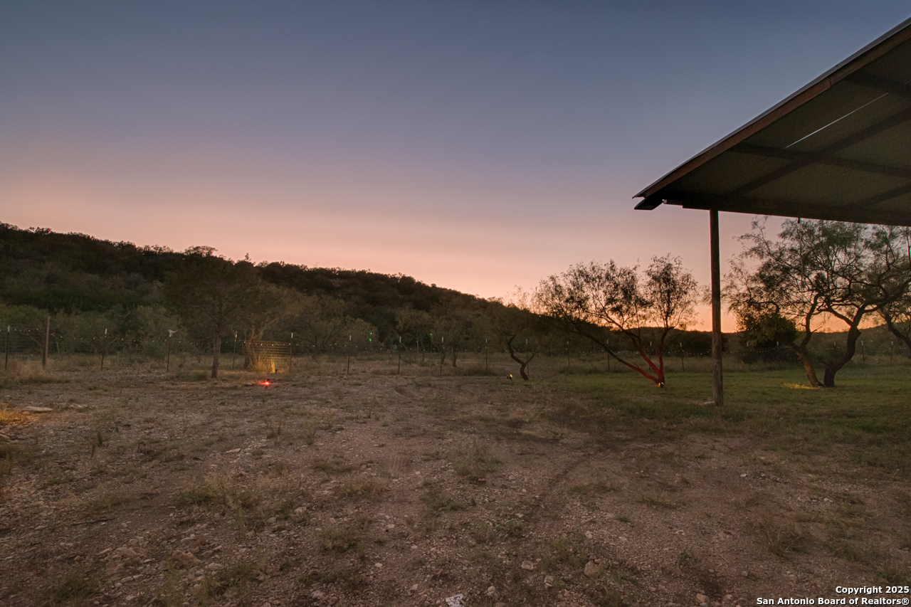 2205 SD 45700 Rocksprings, TX 78880 - Photo 4 of 30 a view of outdoor space with green field
