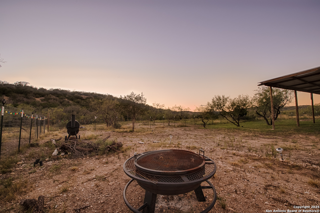 2205 SD 45700 Rocksprings, TX 78880 - Photo 6 of 30 a view of a outdoor space with trees all around