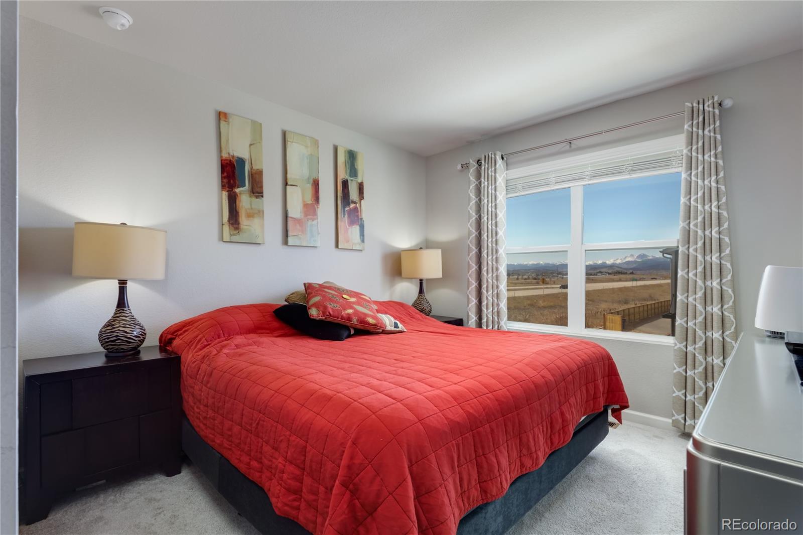 Undisclosed Address Berthoud, CO 80513 - Photo 15 of 26 a bedroom with a bed and window