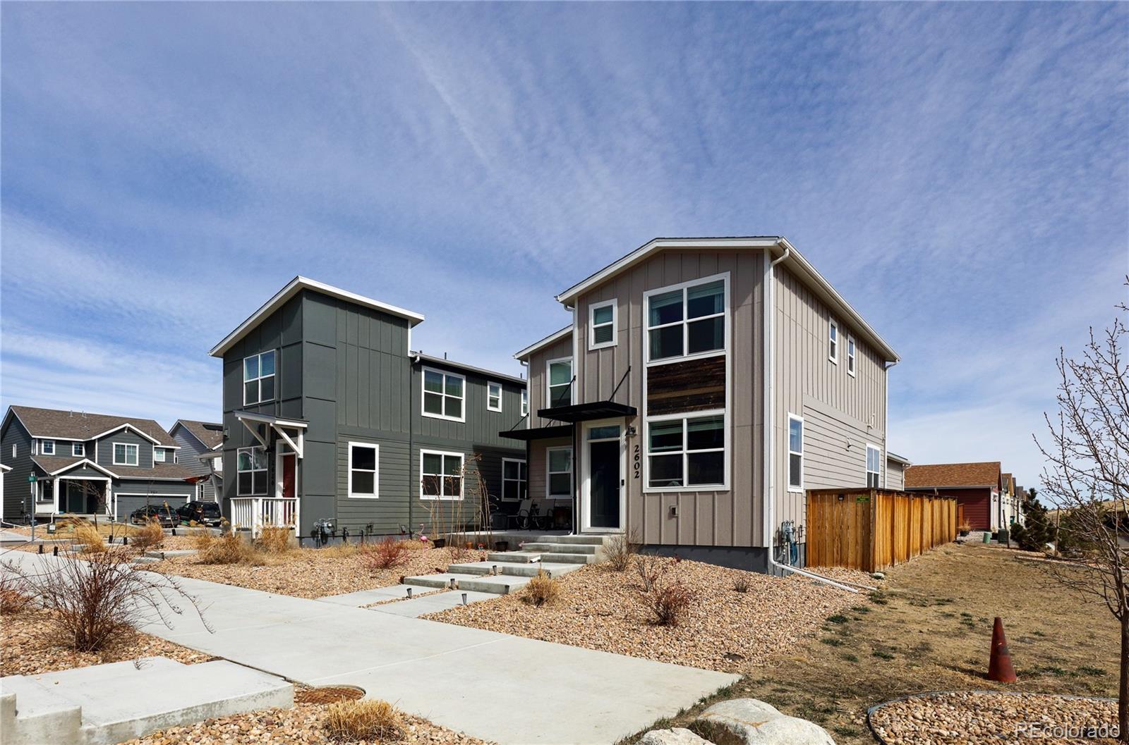 Undisclosed Address Berthoud, CO 80513 - Photo 4 of 26 a front view of a house with a yard