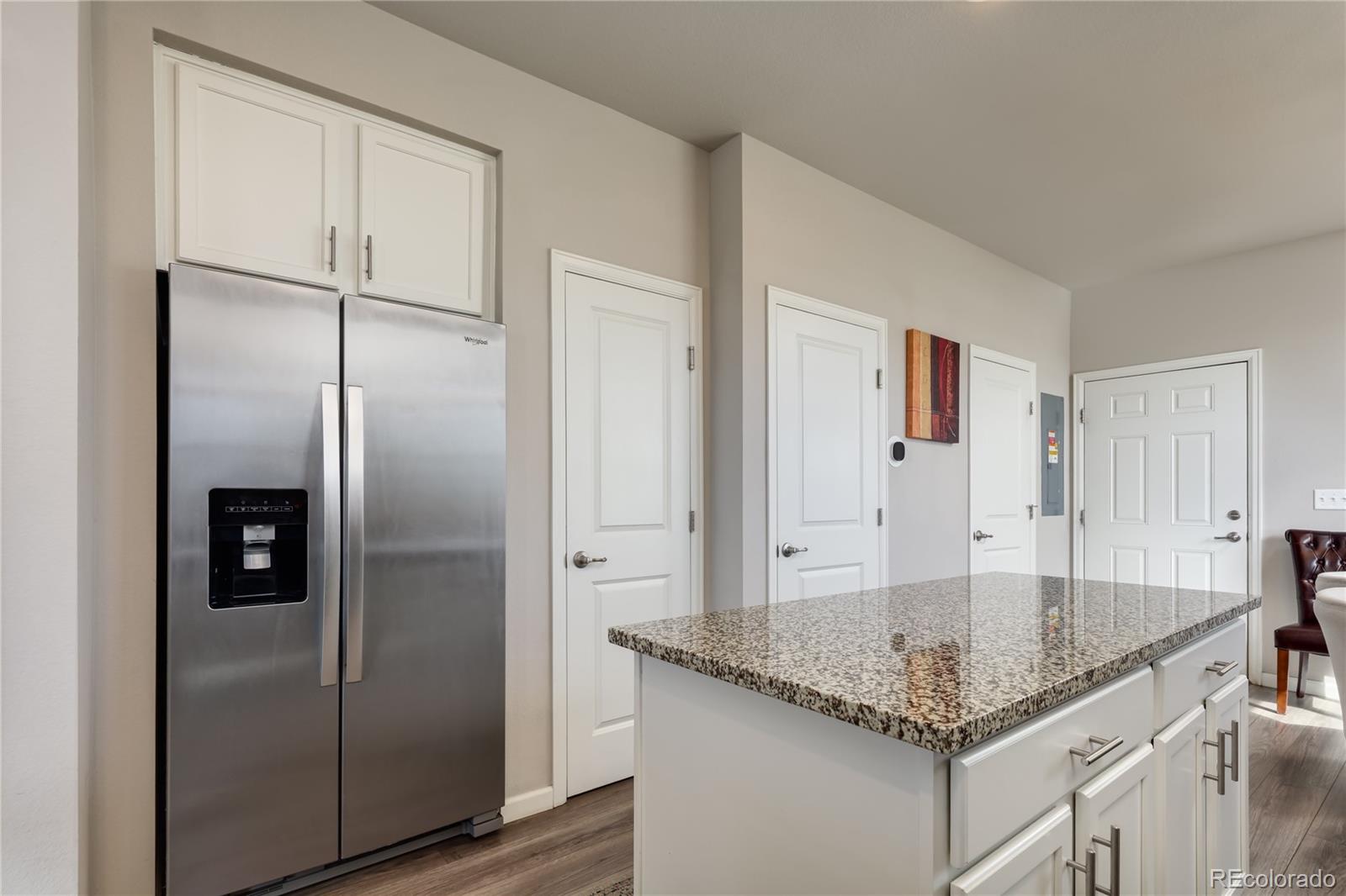 Undisclosed Address Berthoud, CO 80513 - Photo 10 of 26 a kitchen with stainless steel appliances granite countertop a refrigerator and a sink