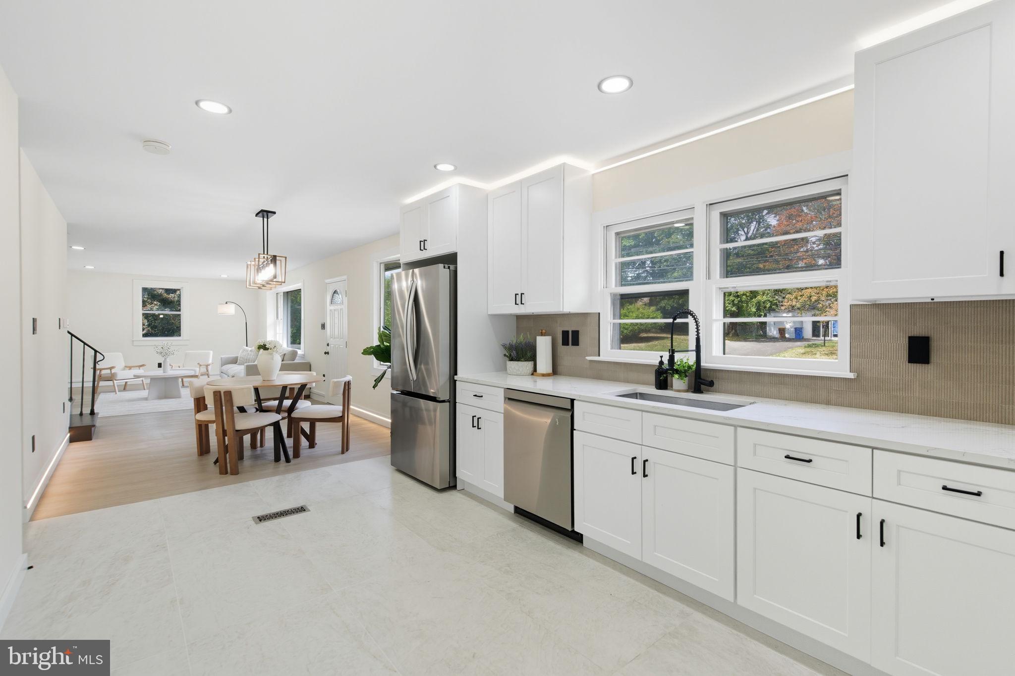 151 Dolington Road Yardley, PA 19067 - Photo 11 of 39 a kitchen with sink and refrigerator