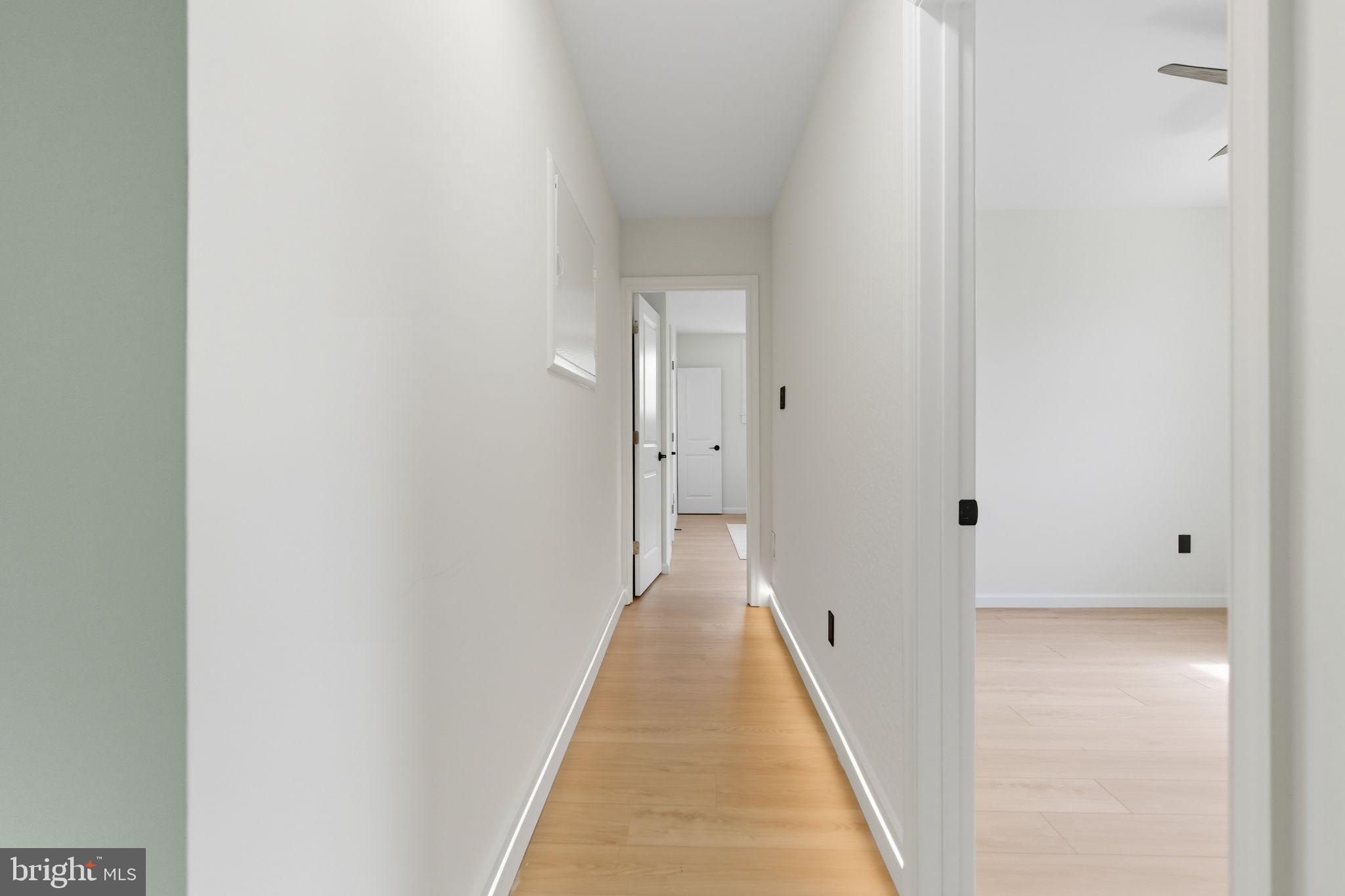 151 Dolington Road Yardley, PA 19067 - Photo 18 of 39 a view of a hallway with wooden floor