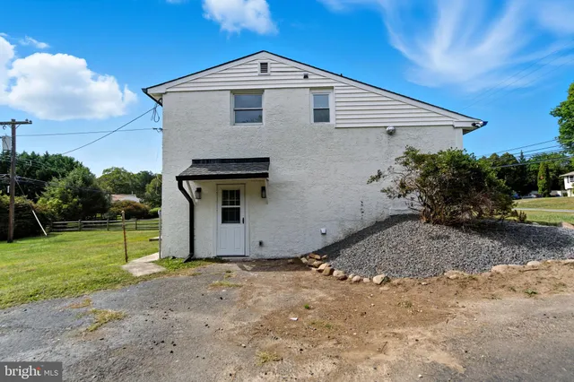 a view of backyard with green space