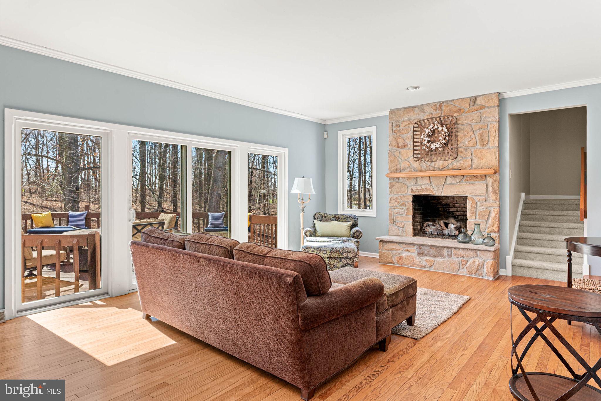 1518 Greenhill Road West Chester, PA 19380 - Photo 18 of 61 Main level living room off kitchen w/ deck access