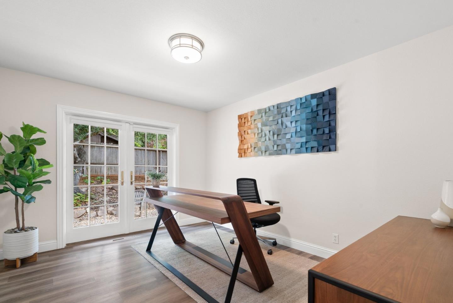 770 Graham Hill Road Santa Cruz, CA 95060 - Photo 46 of 83 a workspace room with furniture and a potted plant