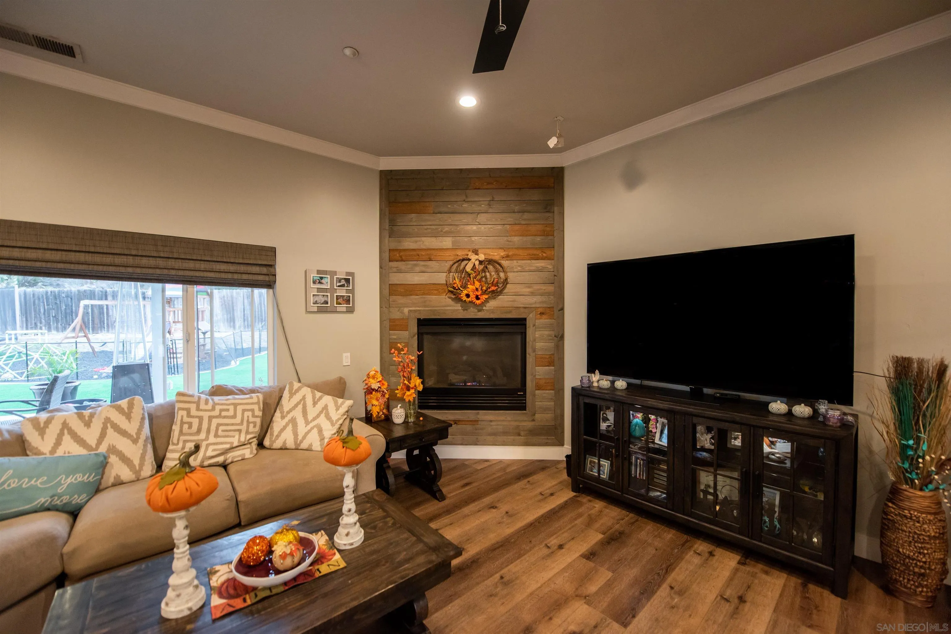 8945 Diamondback Drive Santee, CA 92071 - Photo 11 of 49 a living room with furniture and a flat screen tv