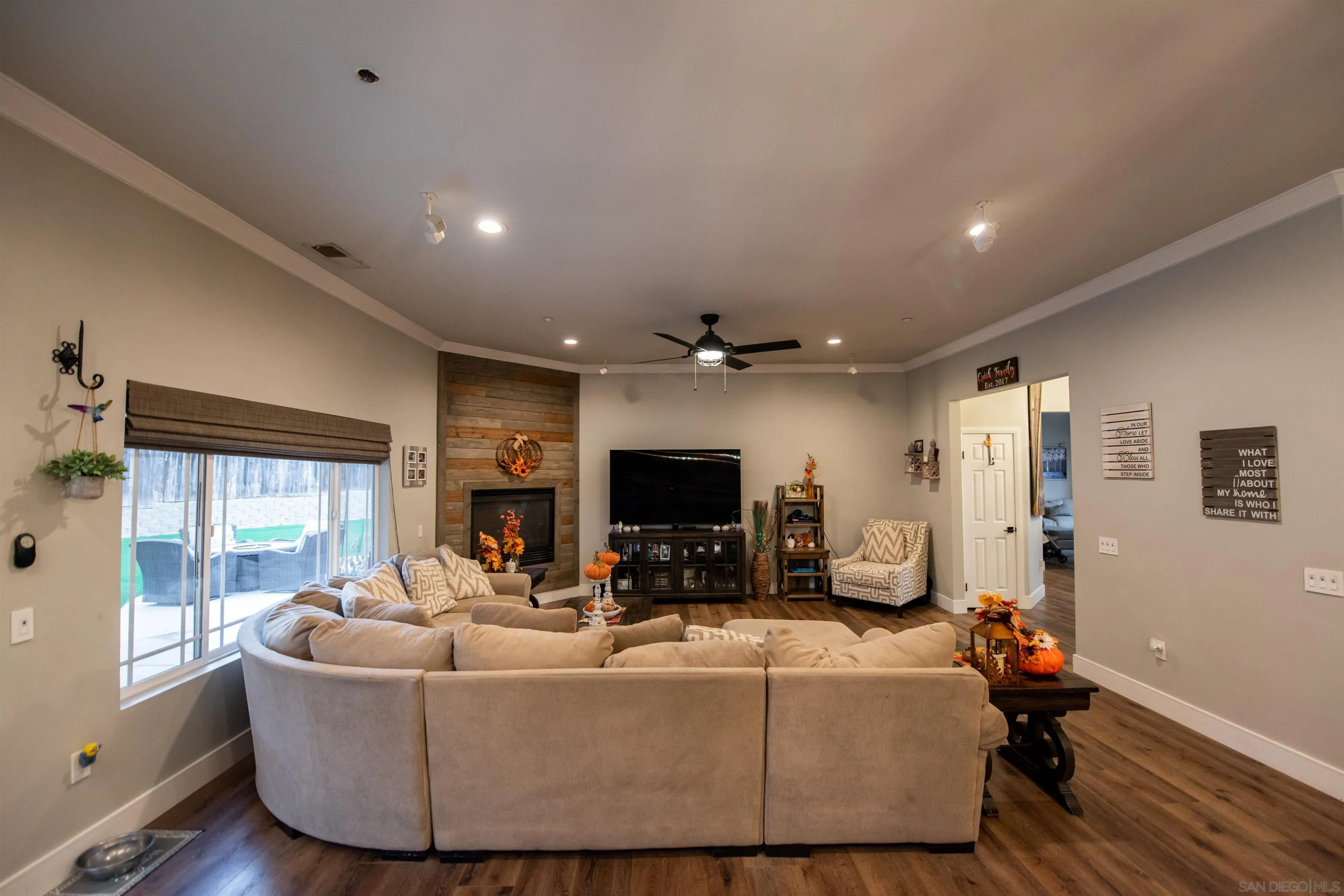 8945 Diamondback Drive Santee, CA 92071 - Photo 14 of 49 a living room with furniture and a flat screen tv
