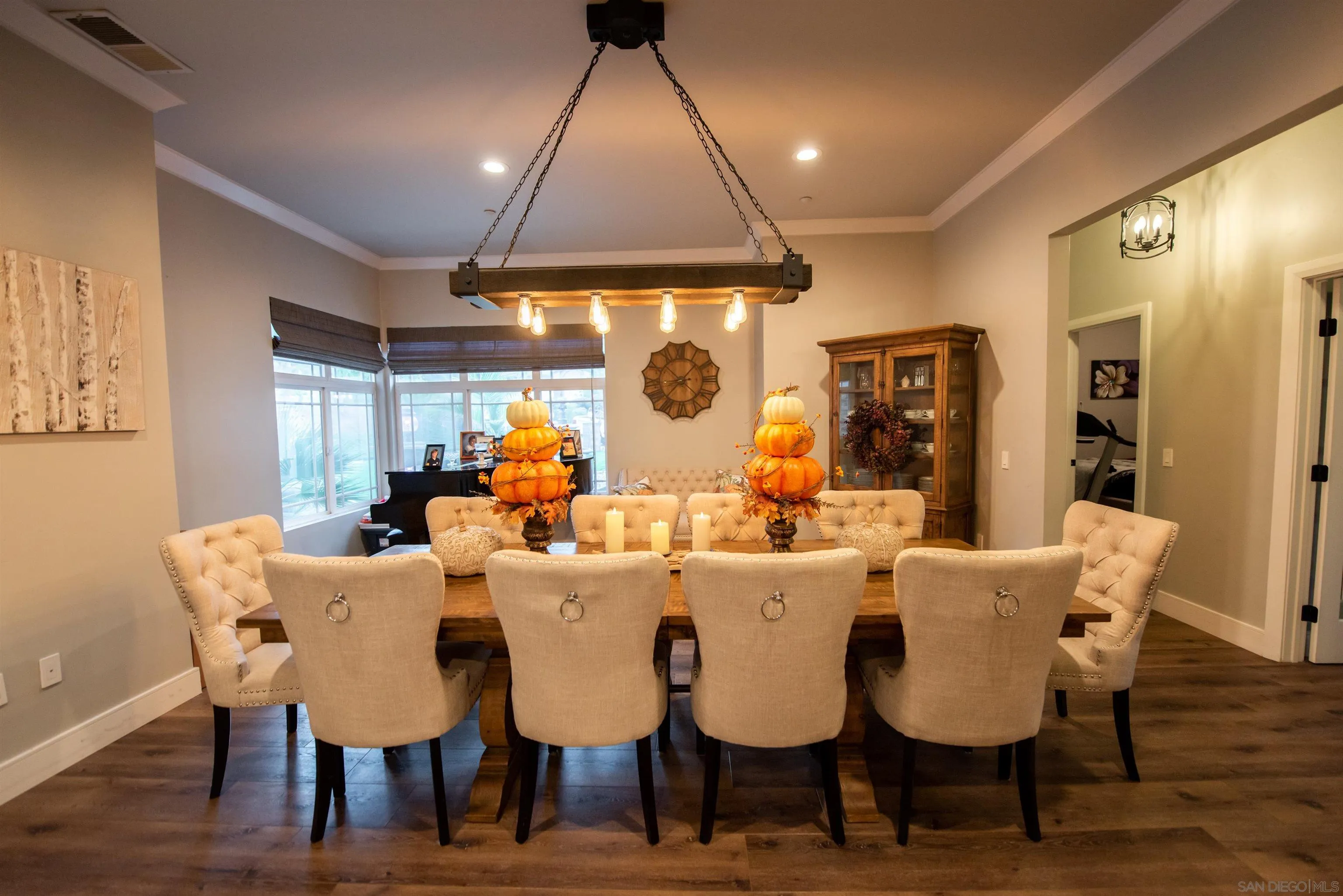 8945 Diamondback Drive Santee, CA 92071 - Photo 18 of 49 a view of a dining room with furniture window and wooden floor