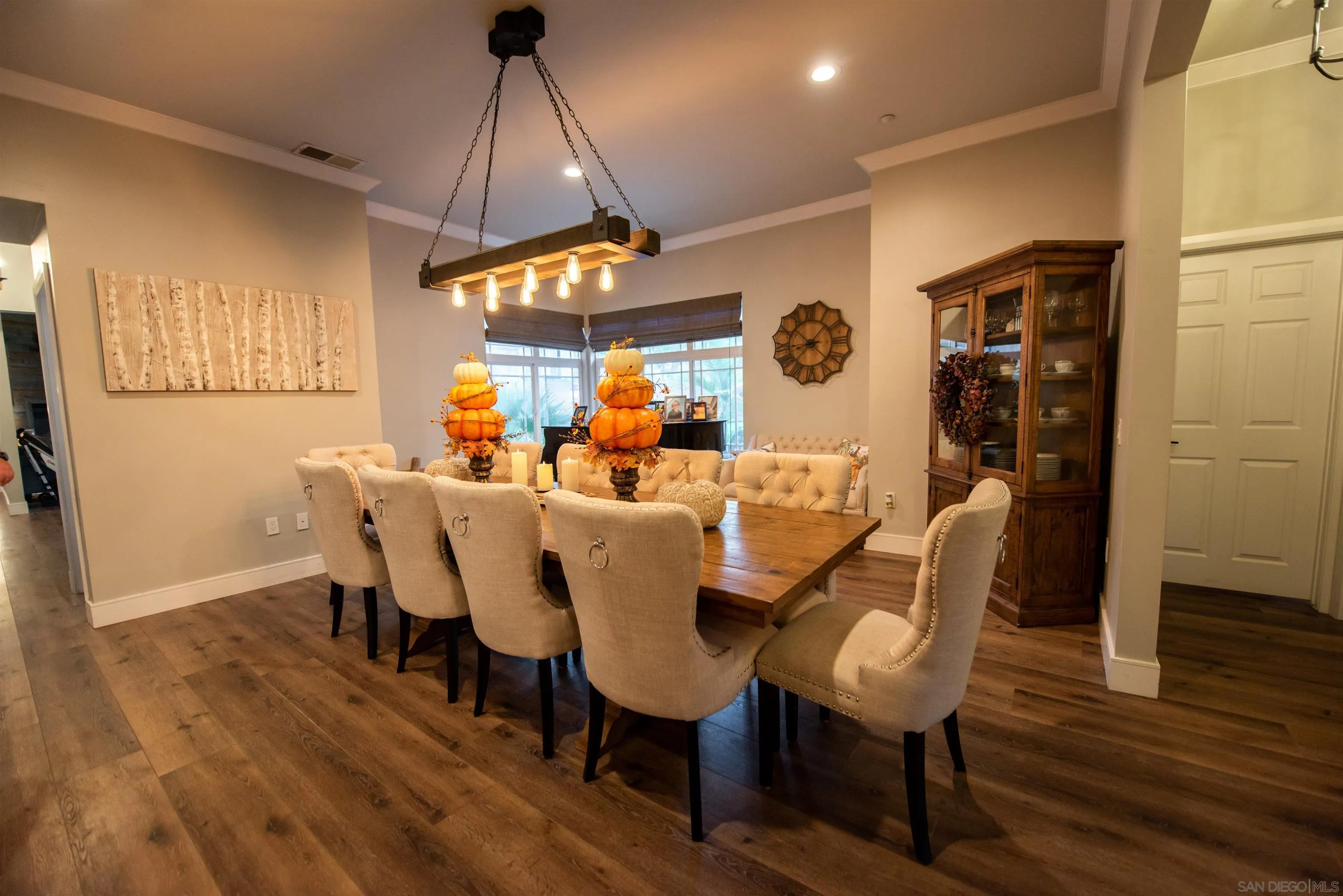 8945 Diamondback Drive Santee, CA 92071 - Photo 19 of 49 a view of a dining room with furniture window and wooden floor